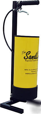 Sand spreader for crack filling sealcoating sealcoat