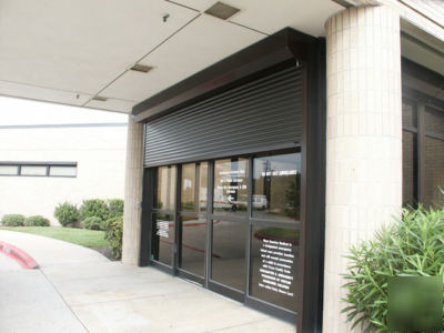 Motorized security storm hurricane rolling shutters