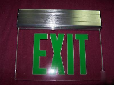 Exit sign, edge lit green letters