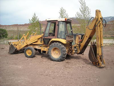 580K case backhoe 1988 extendahoe 2X2