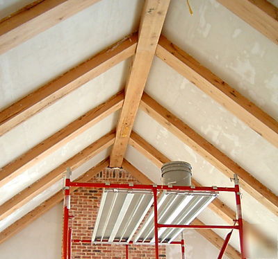 Hand-hewn box beams from reclaimed barn beams