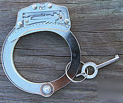 Clear-cuff handcuff cut-away-handcuff training aid