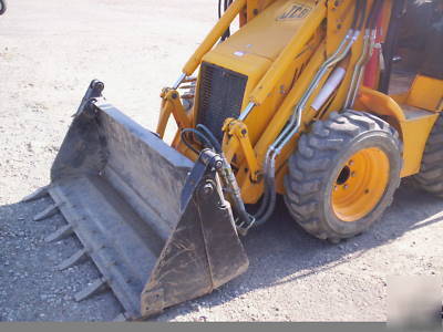 Jcb 208S backhoe loader w/skid steer atachment mount