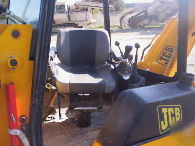 Jcb 208S backhoe loader w/skid steer atachment mount