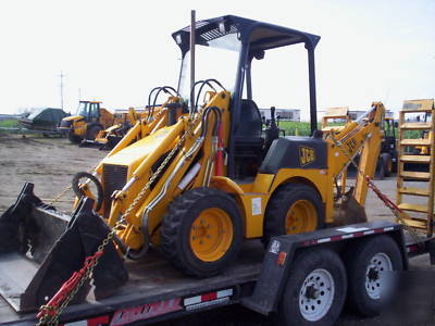 Jcb 208S backhoe loader w/skid steer atachment mount