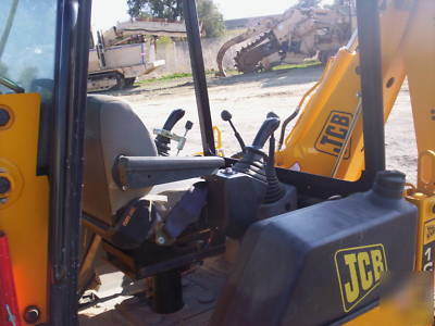 Jcb 208S backhoe loader w/skid steer atachment mount