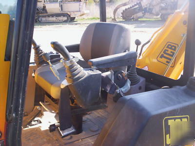 Jcb 208S backhoe loader w/skid steer atachment mount