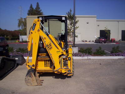 Jcb 208S backhoe loader w/skid steer atachment mount