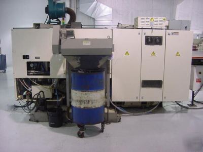 Okuma 4-axis cnc turning center w/barfeeder & robot