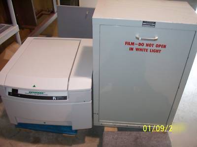 Automatic x-ray film processor and film loading bin