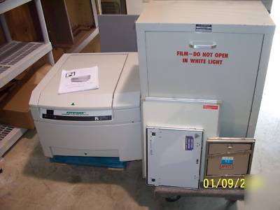 Automatic x-ray film processor and film loading bin