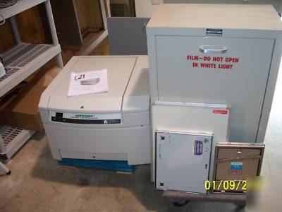 Automatic x-ray film processor and film loading bin