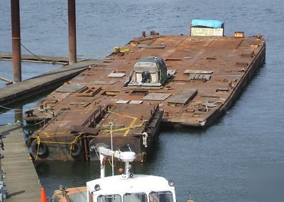 100 tons of scrap iron / steel in the shape of a barge