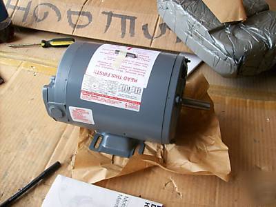 New dayton electric motor model 2N 880, hp. 1/2 ph. 3