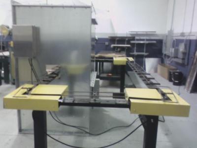 Down draft paint spray booth + chain on edge conveyor