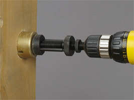 Automatic holesaw arbor system