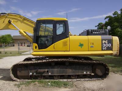 Komatsu PC300 hydraulic excavator, used, only 879HRS