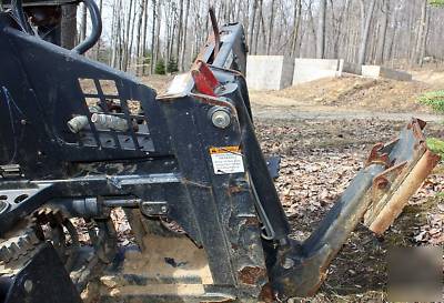 Bobcat 709 backhoe attachment w/ stabilizers