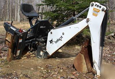 Bobcat 709 backhoe attachment w/ stabilizers