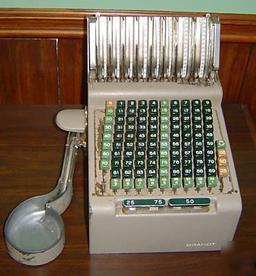 Brandt cash register coin dispenser and quick change 