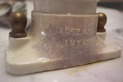 Antique porcelain commercial light sockets--on marble 