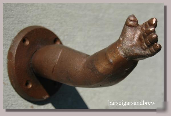Yes bizarre cast iron baby arm wall hook old