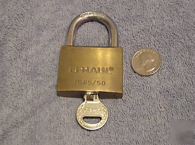Heavy duty u-haul brass padlock w/1 key.