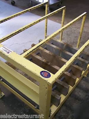 Battery handling system battery charger station stand