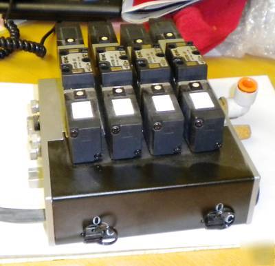 4 smc VFS2000 series 5 port solenoid valves on manifold