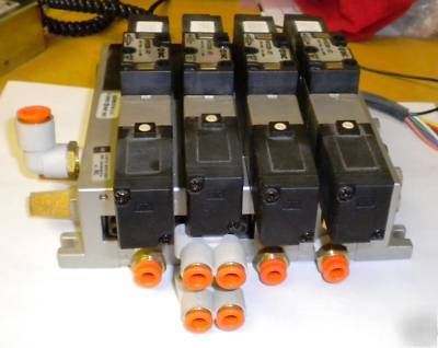 4 smc VFS2000 series 5 port solenoid valves on manifold