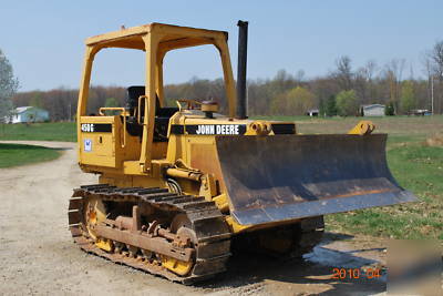 John deere 450G dozer with root rake- no 