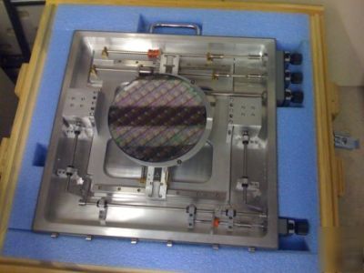 Precision wafer positioner, translation & rotation