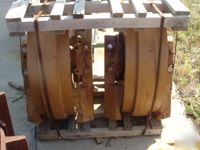 Komatsu D155 idler with brackets