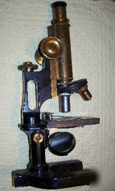 Antique bausch & lomb optical 2-head microscope brass