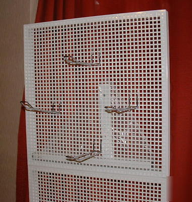 Free standing metal display stand with adjustable hooks