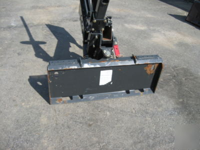 Bobcat silt fence installer attachment for skid steer