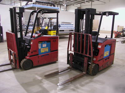 (2) schaeff W40 electric stand-up forklift low hours