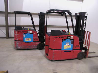 (2) schaeff W40 electric stand-up forklift low hours