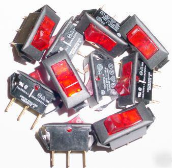 Lot of ten - single pole mains neon rocker switches